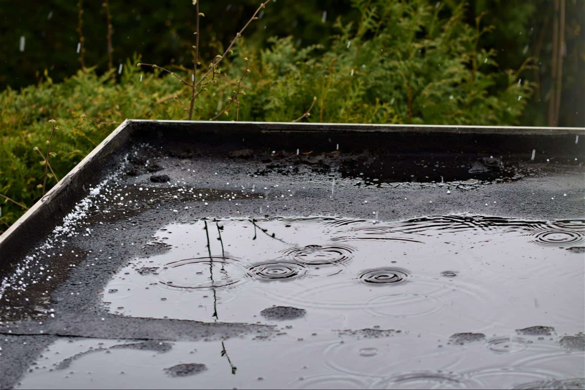Ponding water refers to the accumulation of water on your roof’s surface for an extended period, typically 48 hours or more following rainfall.